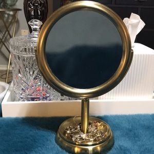Gold table mirror with ring holder